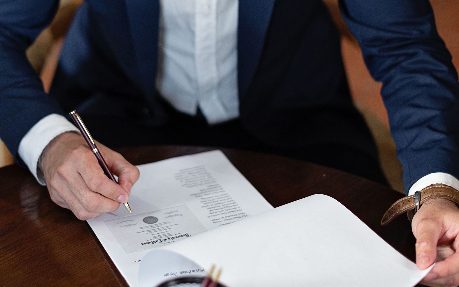 Invoices and paperwork spread across a desk