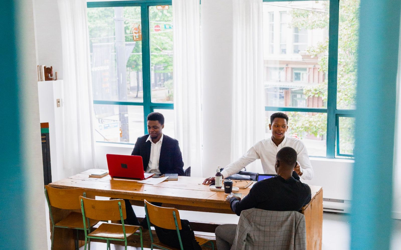 A young team collaborating around a desk